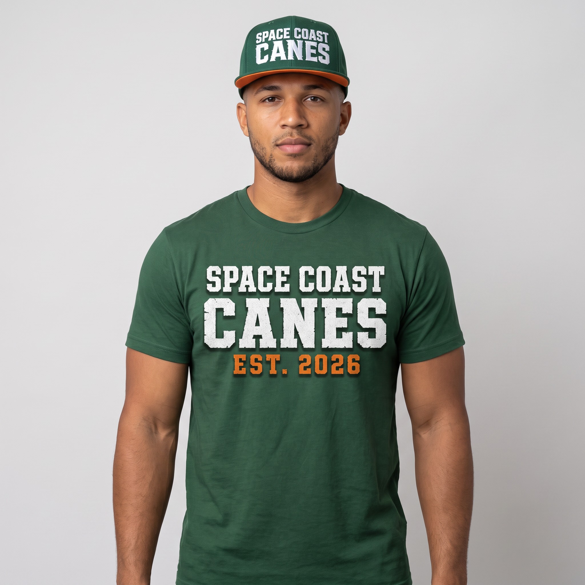 Space Coast Canes member wearing the green distressed wordmark t-shirt and matching green snapback hat