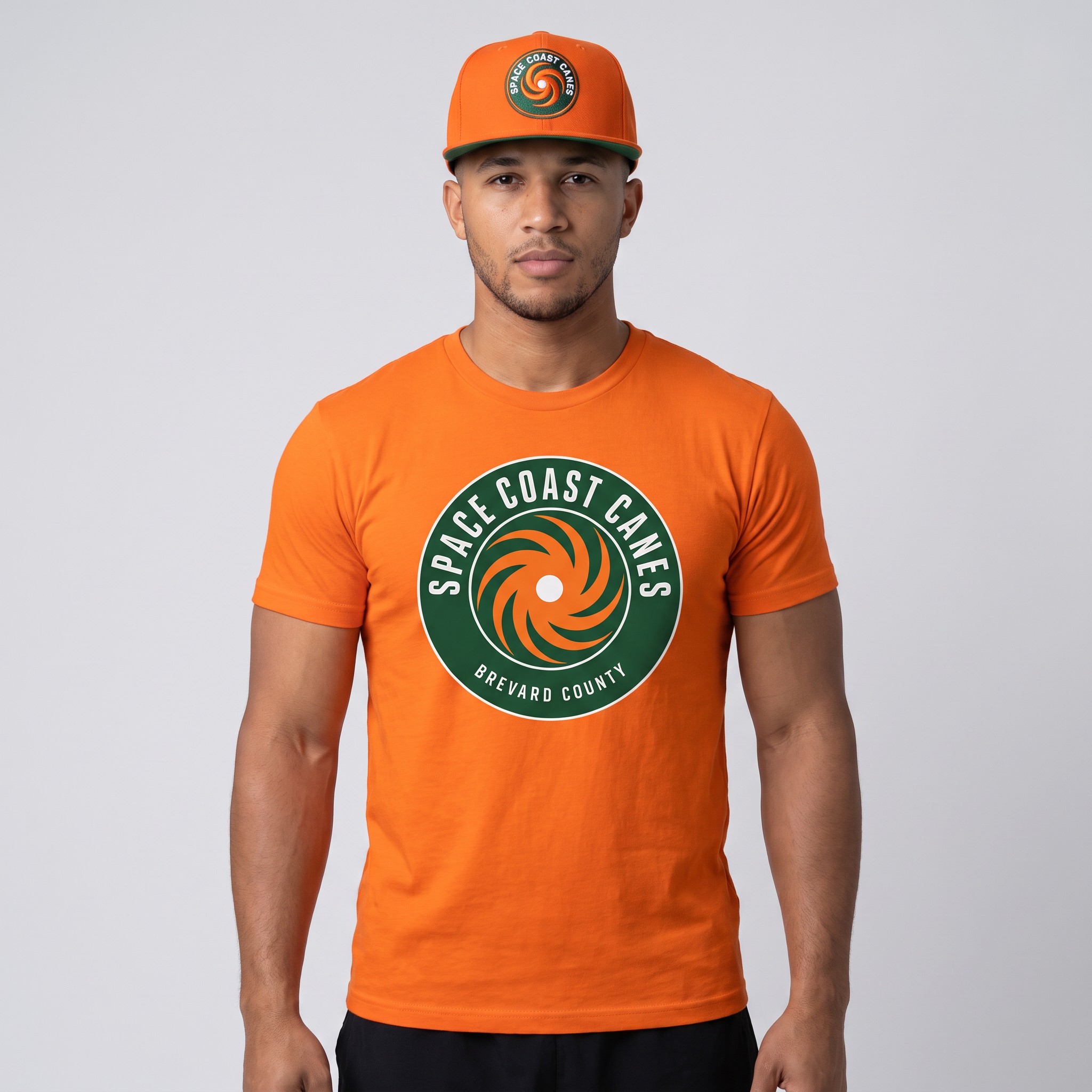 Space Coast Canes member wearing the orange hurricane badge t-shirt and matching orange snapback hat