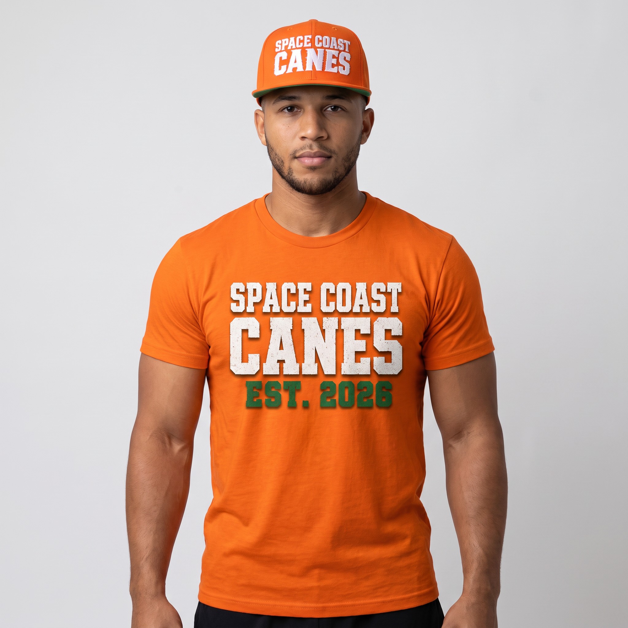 Space Coast Canes member wearing the orange distressed wordmark t-shirt and matching orange snapback hat