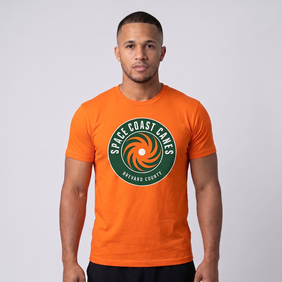 Space Coast Canes member wearing the orange hurricane badge t-shirt